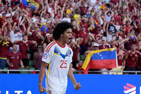 Venezuela's Eduard Bello celebrates after scoring a 
 goal 